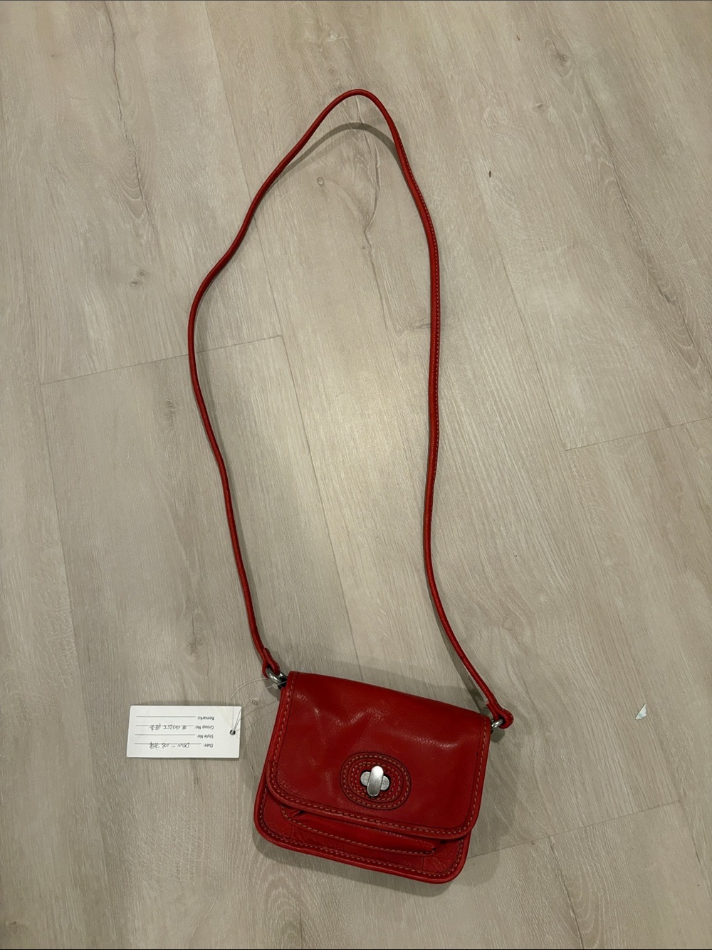 Universal Red Leather Crossbody Bag with Turn-Lock Accent